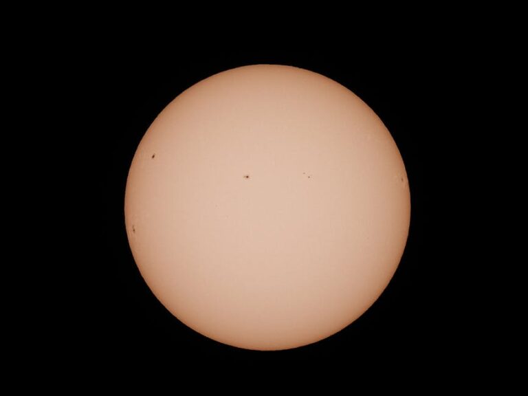 Close-up of the sun with visible sunspots, captured from Pittsburgh, PA.