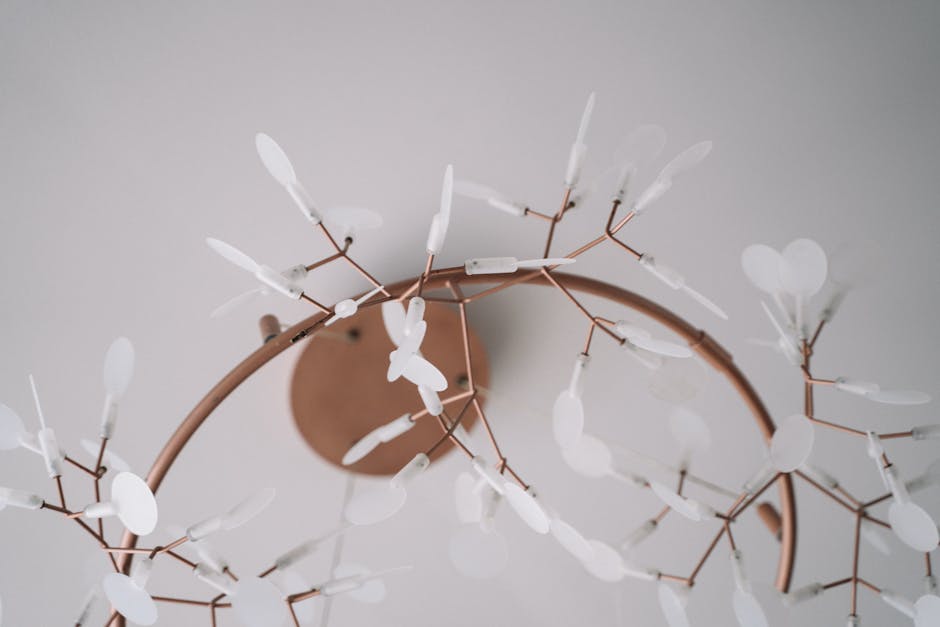 Elegant modern chandelier with unique branching design for stylish interiors.